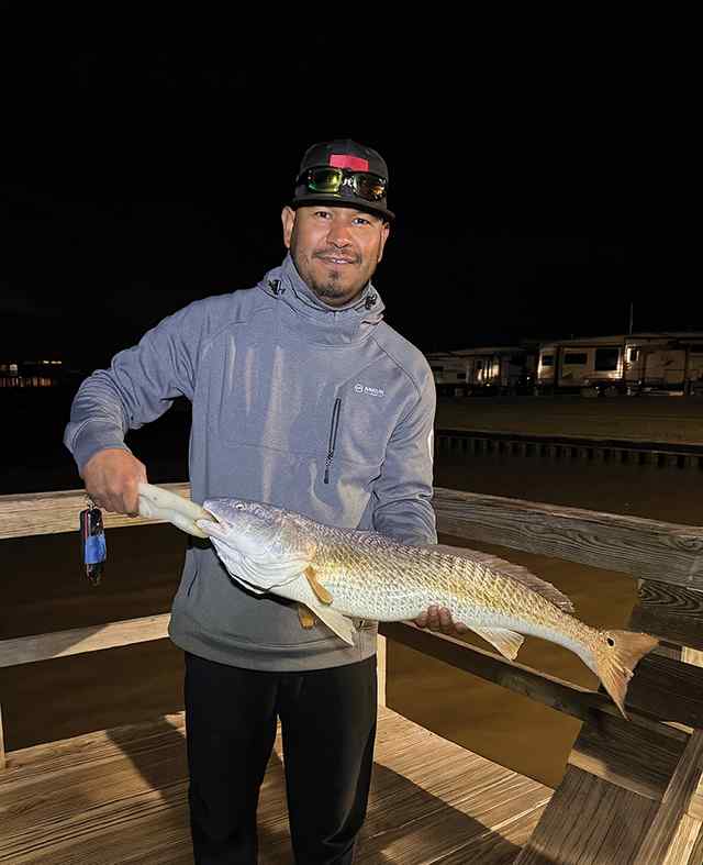 Luis Matagorda - 34" 11 lb first red drum!