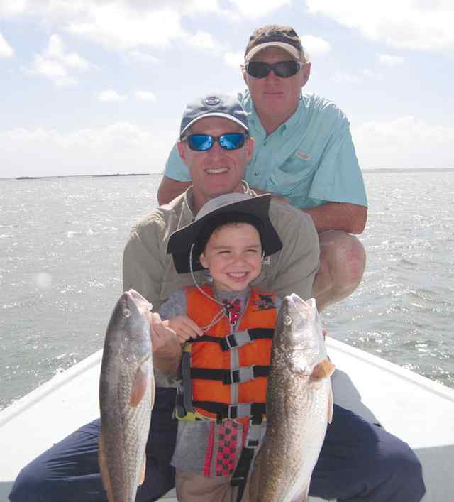 Hayden Barker with Dad and Grandad Estes Flats24&quot; &amp; 21&quot; first keeper reds