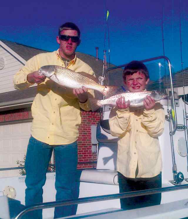 Matt & Cody Fish Galveston Bay22&quot; red &amp; 18&quot; trout