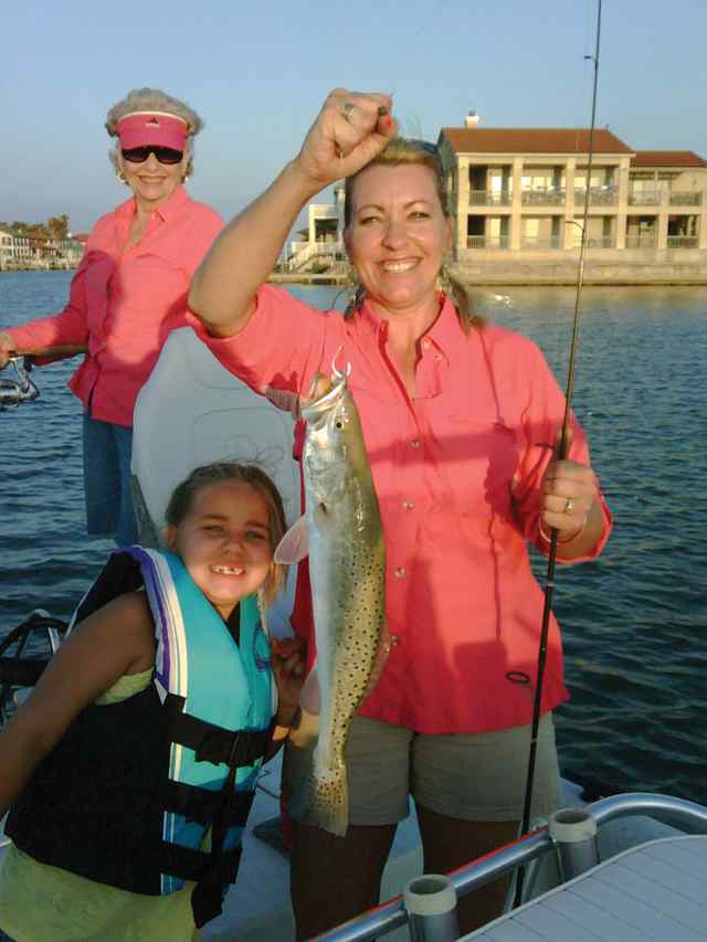 Camber Holland and mom Port Aransasfirst trout!