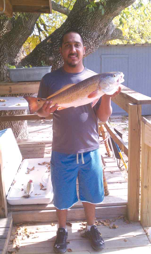 Jose Rodriguez Wallisville Lake27&quot; first redfish!