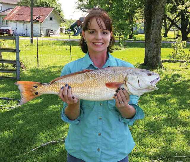Jennifer Keprta West Matagorda, wading the south shoreline27&quot; first upper slot red!