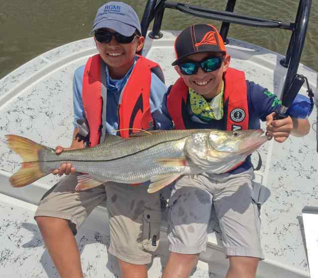 Eric Sepulveda & Hondo Carrales South Padre Island37&quot; snook CPR
