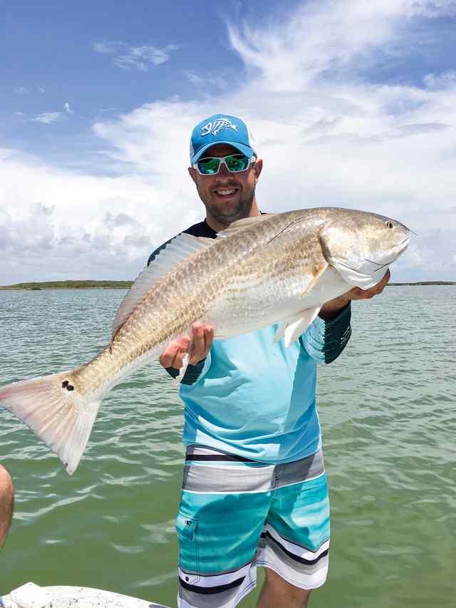 Eric Champion Lower Laguna Madre - 35.5" personal best redfish! Caught while live lining croaker on the edge of the channel, last bait for the day.
