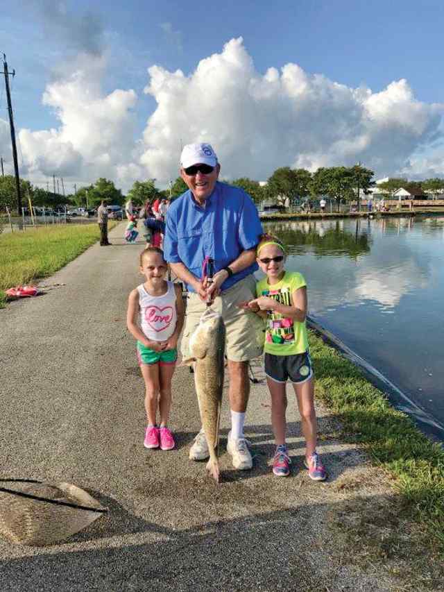 Kelsey & Whitney Chumchal Sea Center Texas - first redfish!