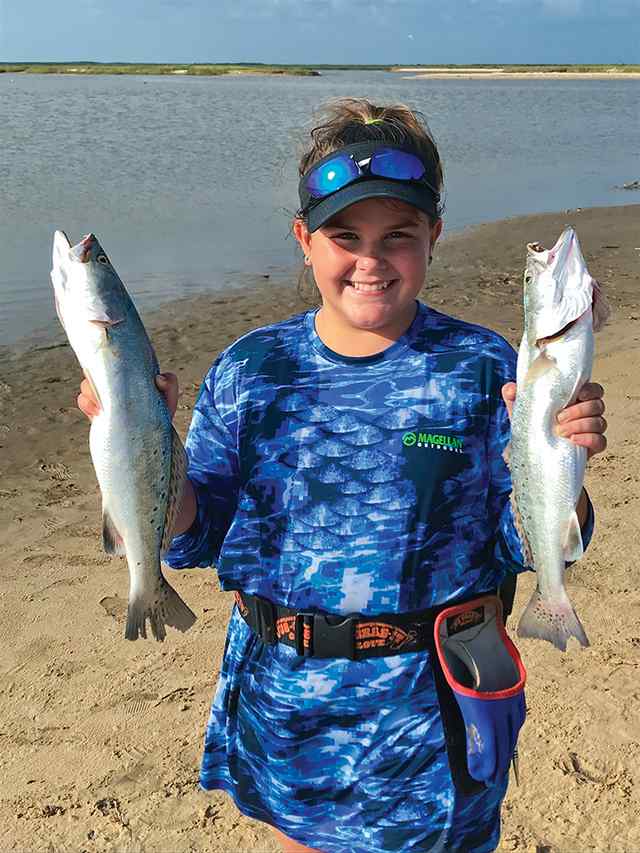 Haley Jones Sargent Beach - 17" & 19" first trout! Only catches of the day!