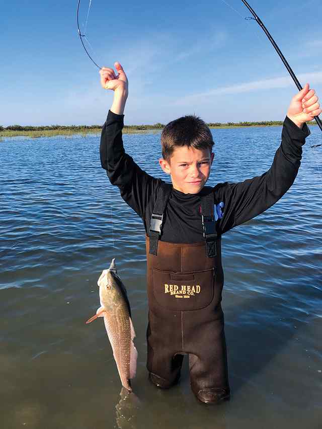 Brady Coleman POC - first redfish! Caught on plastics while wade fishing.