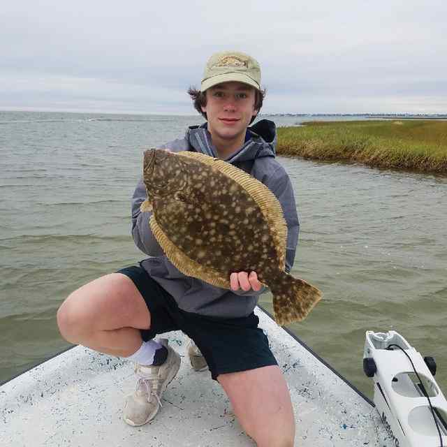 Carter Hoogendam West Galveston Bay - 19" flounder