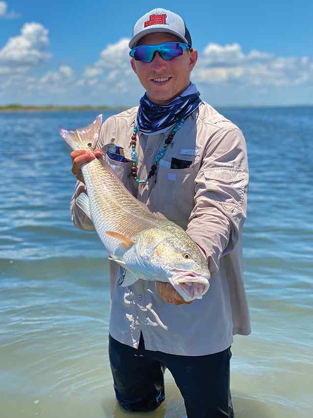 Trace Bucey Baffin Bay - 31.5" bull red, caught on a solid pearl Mirrolure provoker