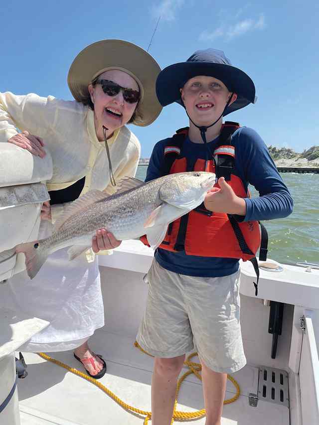 Gus Forrester & grandmother, Mary Lil Chappell Packery Channel, North Padre Island - 22" redfish, caught using live shrimp and constant talking