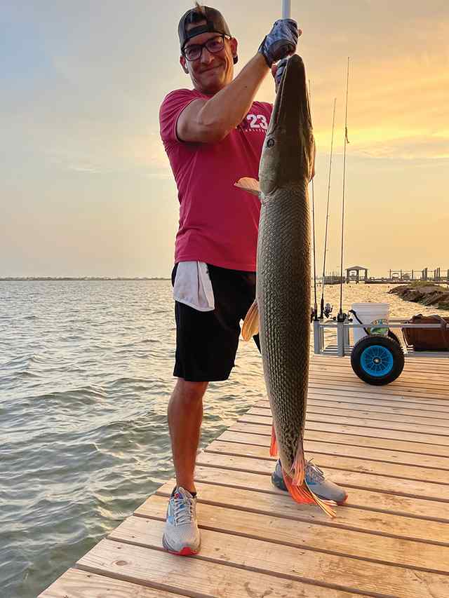Robert Rodriguez Offatts Bayou, Galveston - 47" gar, caught on a popping cork with a small live croaker as bait