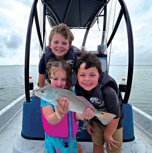 Luke, Levi, & Kate Redfish Bay - redfish, first saltwater fishing trip!