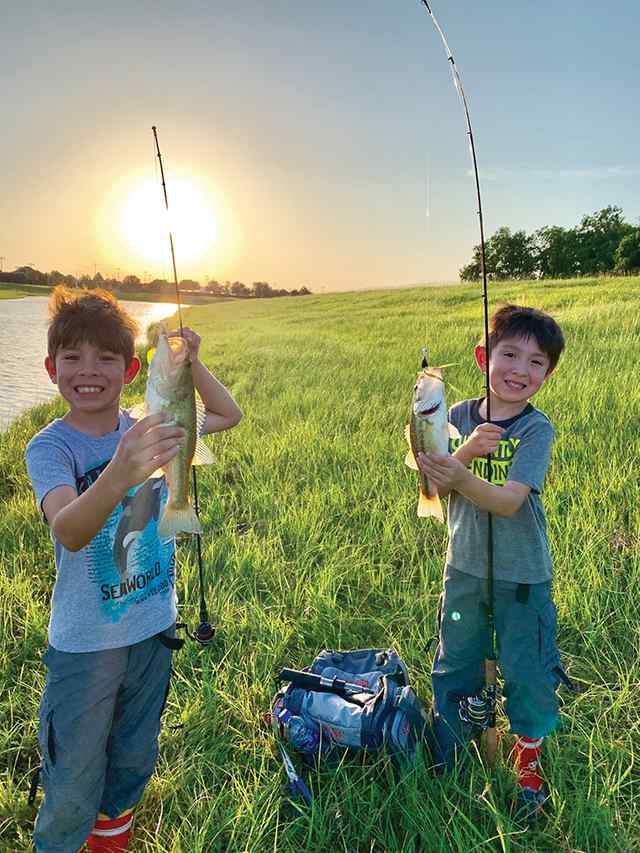 Steele & Ace De Leon Friendswood - largemouth bass, caught on spinning rod/reel combo with 1/4 oz bladed jig head and Strike King black & chartreuse curly tail grub