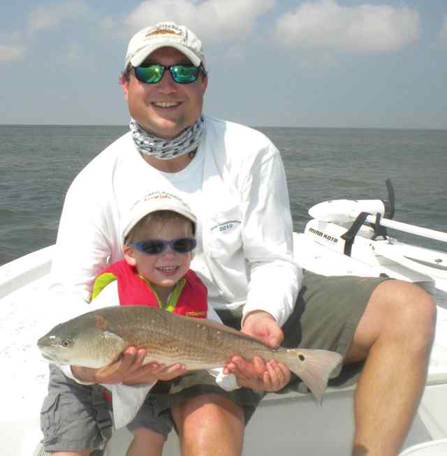 McCoy Wolthoff Laguna Madre23&quot; first redfish!