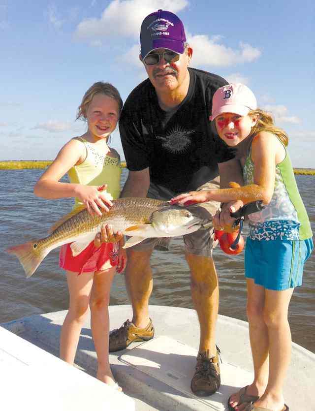 Pat Adams, Ava Adams, & Izzy Delgado redfish