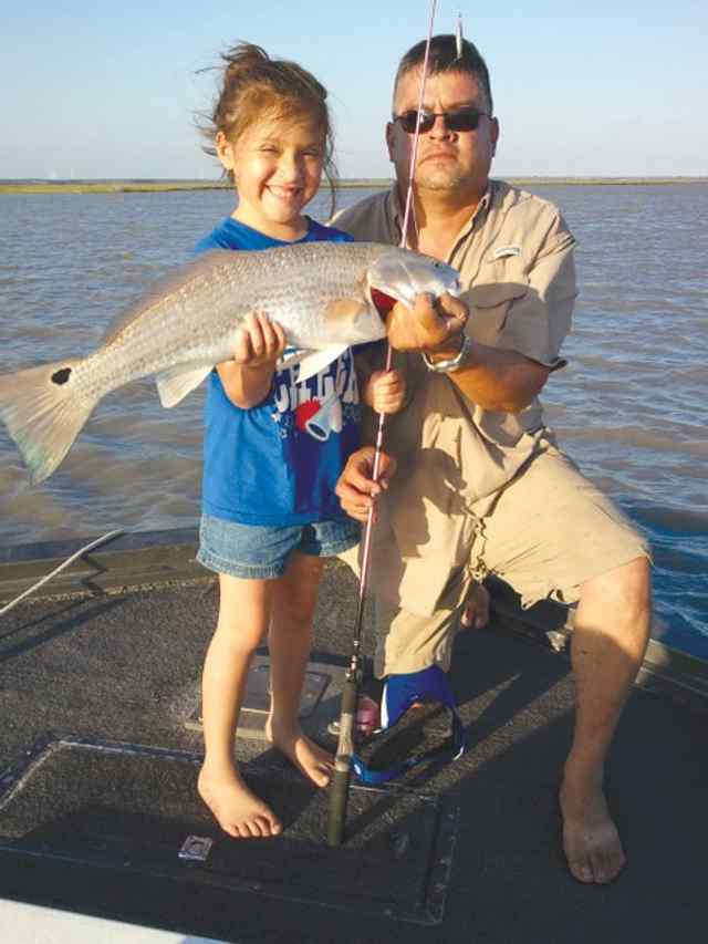 Emma Doria with dad, David Nueces Backbay26.5&quot; redfish
