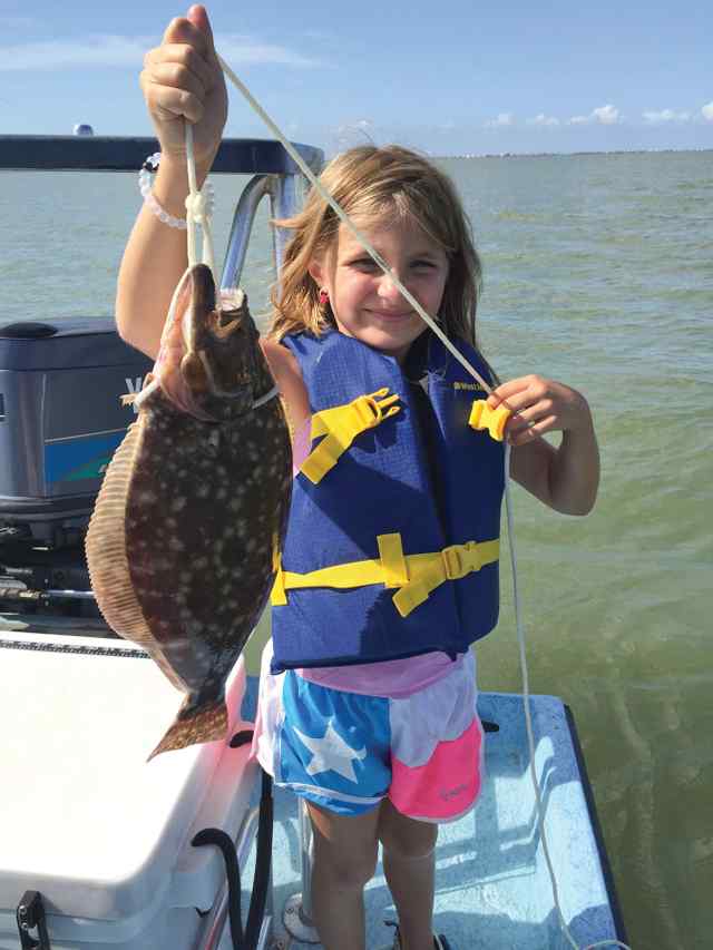 Ava Baum Fishing with Dad in West Bayfirst flounder!