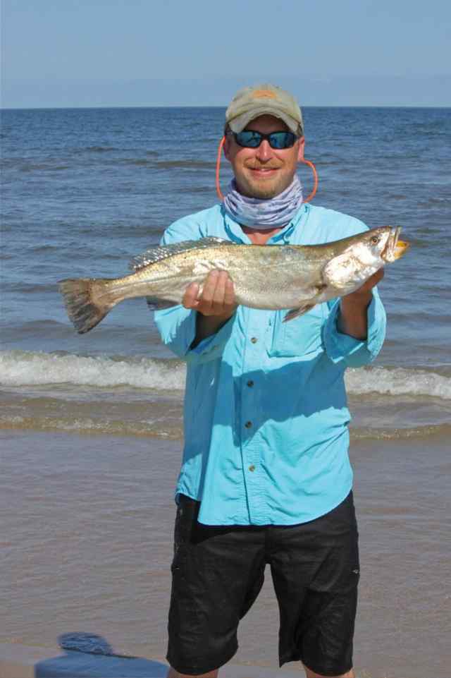 Christopher Edwards Surfside beach27&quot; trout CPR, caught in the first gut, wade fishing