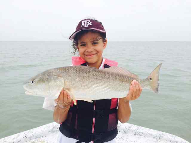 Graciela Gisela Williamson Lower Laguna Madre26&quot; first redfish!
