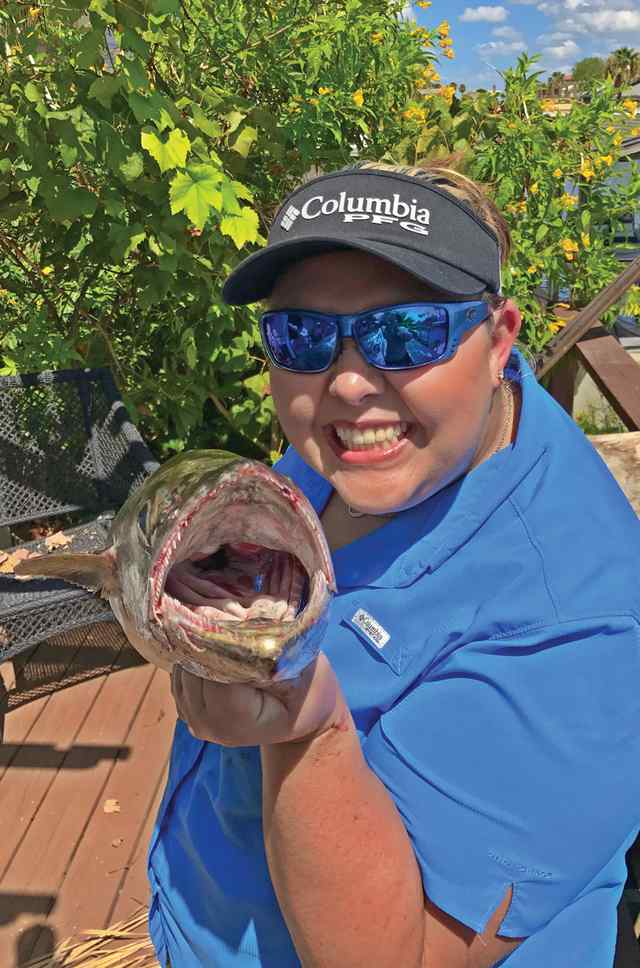 Lisa Bockholt 44" kingfish, caught on an artificial shallow diver