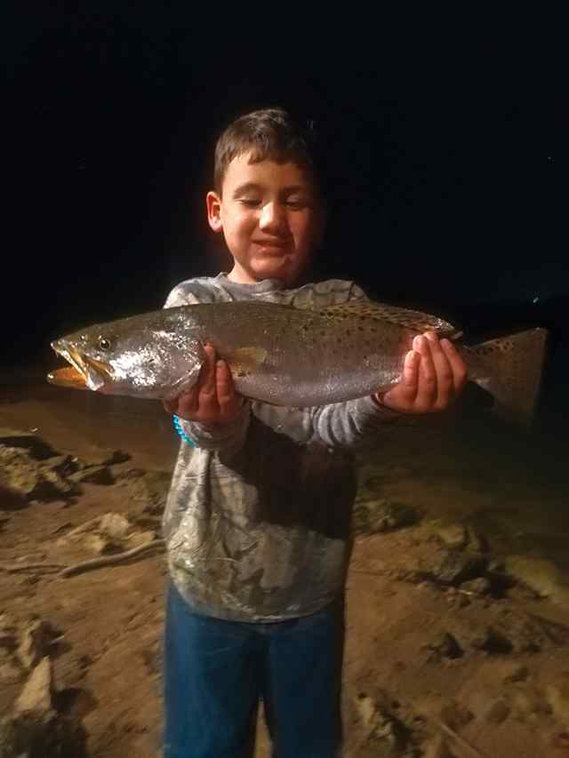 Layven James Hernandez Brazos River, Freeport - 22" speckled trout, first time fishing in the lights