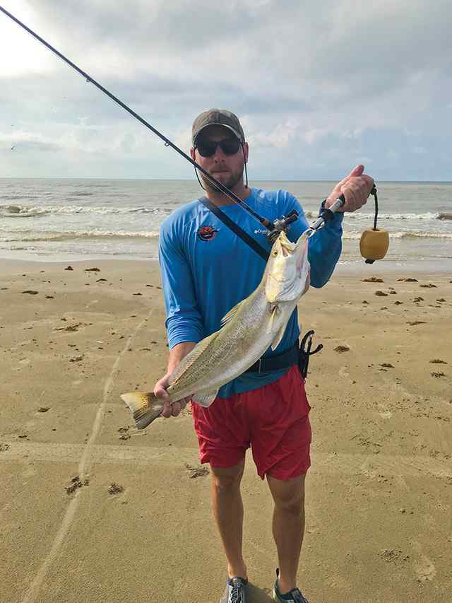 Zach Thomas Galveston surf - 27.5" 7 lb speckled trout, caught on a pink Trout Support lure