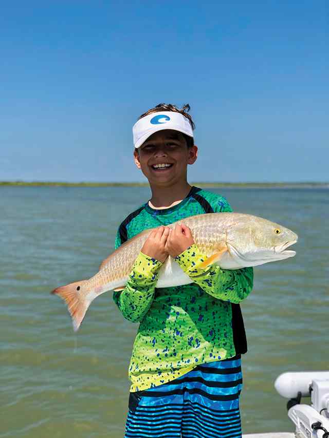 Asa Buckley Rockport - 27" first redfish!