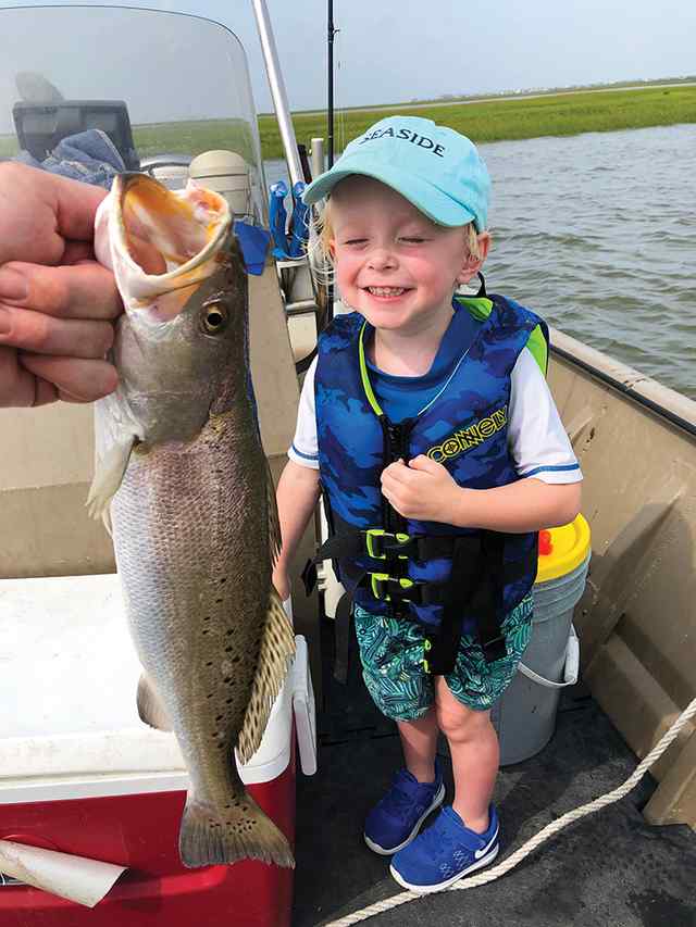 Grayton Holloway West Bay - first fish! Caught on first fishing trip in a boat, with dad