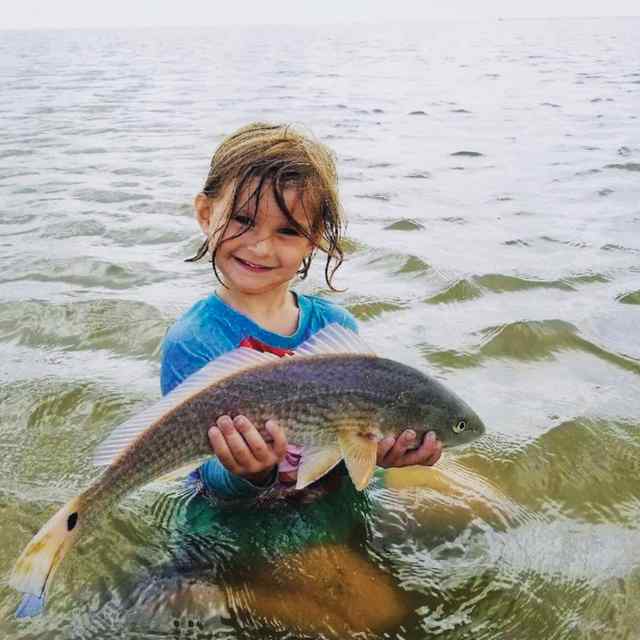 Ella Oaks Galveston Bay - 21" redfish CPR, caught by Ella's dad, David; released by Ella