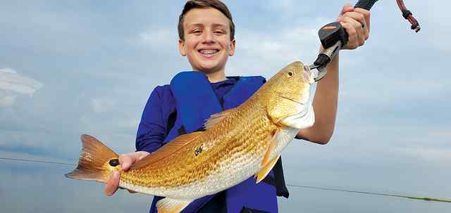 Conrad Adix redfish, fishing with PawPaw