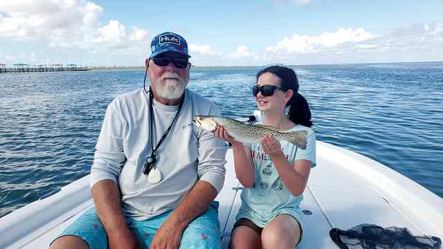 Julia Dugan with John Jacobs Laguna Madre - first trout!