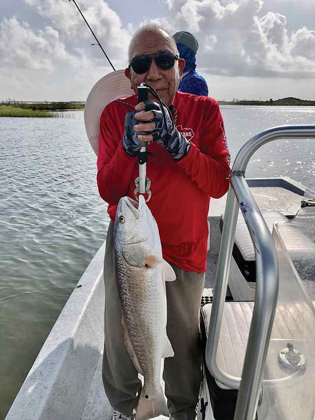 Mike Vasquez Estes Flats - 31" redfish, first time fishing on flats!