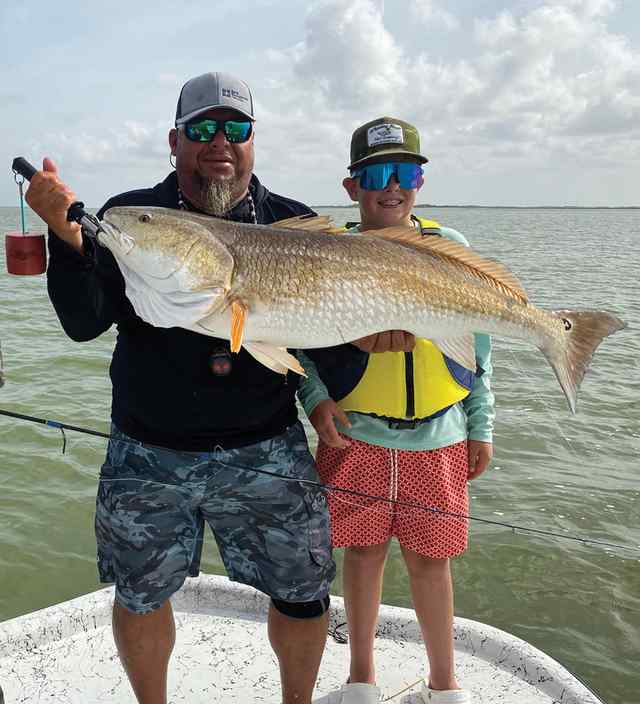 Dos Vielock (right) with Ruben Garza 42" personal best red!