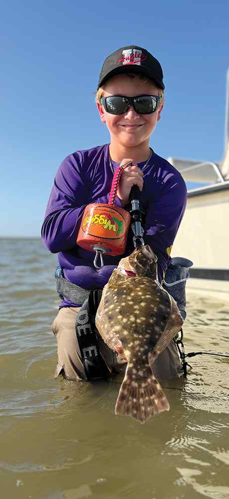 Beau Weller East Matagorda Bay - flounder, caught on on K Wigglers Bone diamond paddle tail; Knotty Hooker jig head with a K Wigglers K clip