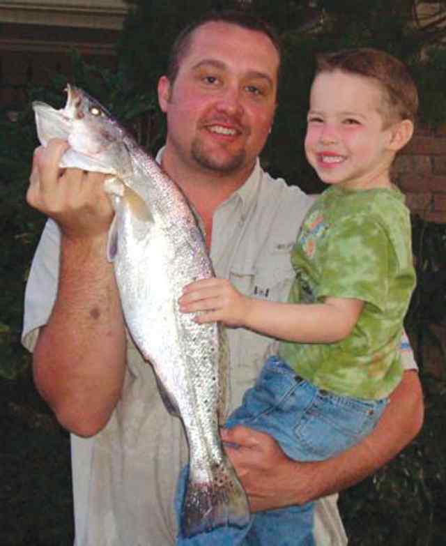 Andrew Schock & dad, Trey Kemah - 25” trout
