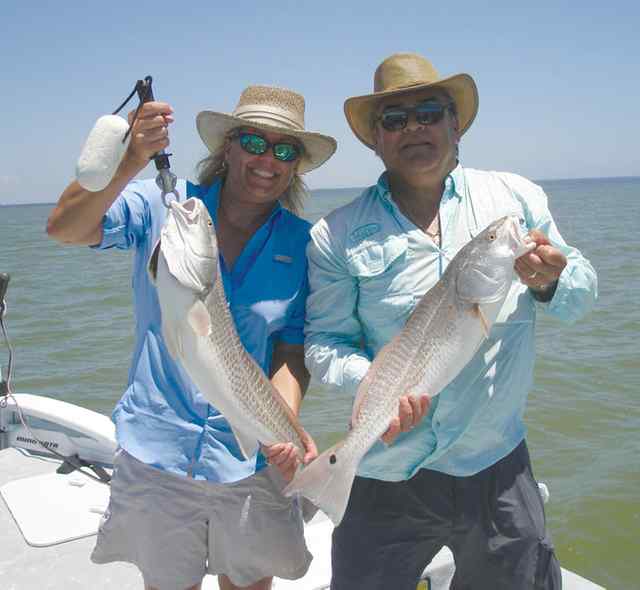 Christi & David Diaz Baffin Bay29&quot; &amp; 25&quot; reds, Christi's first!