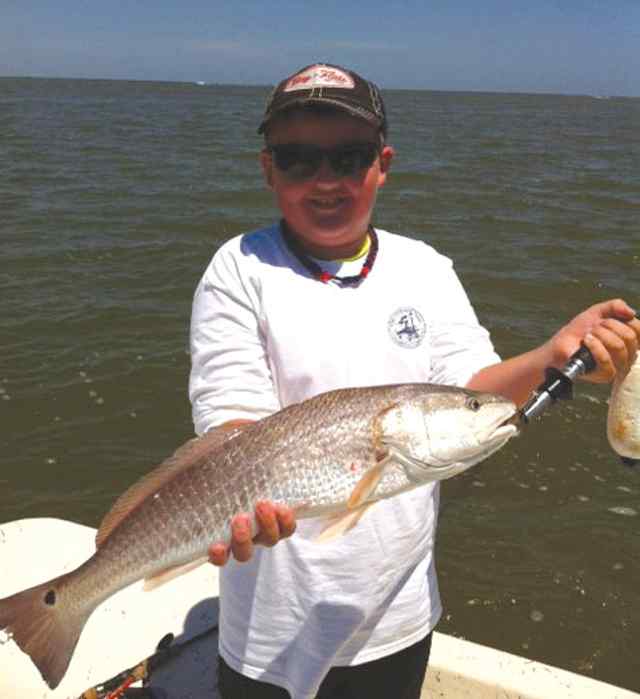 Jagger Fishbeck Pringle Lake24.5&quot; first redfish!
