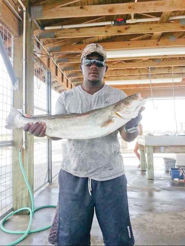 Justin Lathon Matagorda30&quot; first trout!