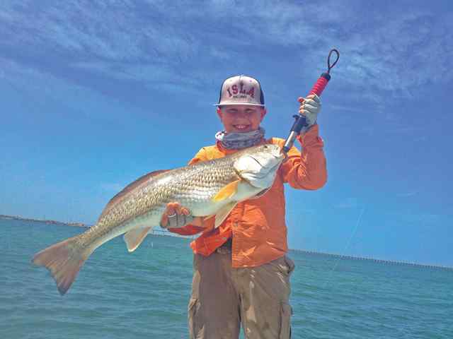 Carson Wegener South Padre Island34&quot; redfish, while fishing with father