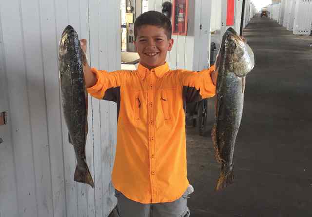 Jaret Kelley Galveston jetty boat cut26&quot; &amp; 27&quot; first two specks!