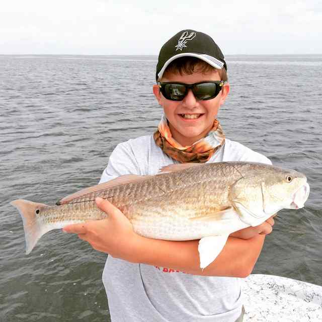 Alejandro Villarreal Laguna Madre27.5&quot; first redfish!