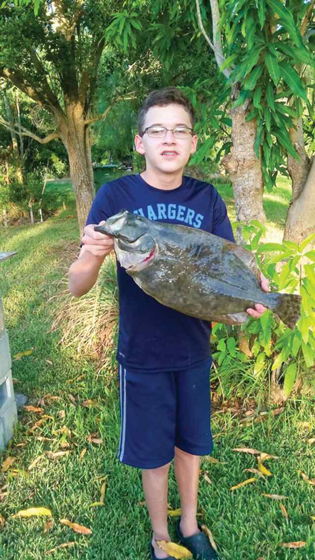 Luke McKinney Port Mansfield - 22" first flounder!