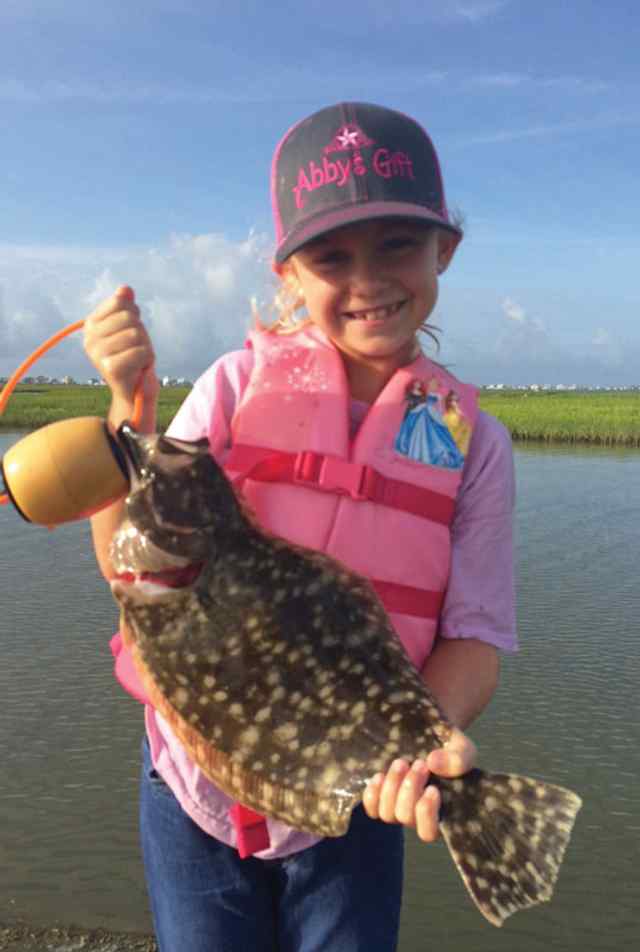 Grace Wilganowski West Matagorda Bay18&quot; first flounder!