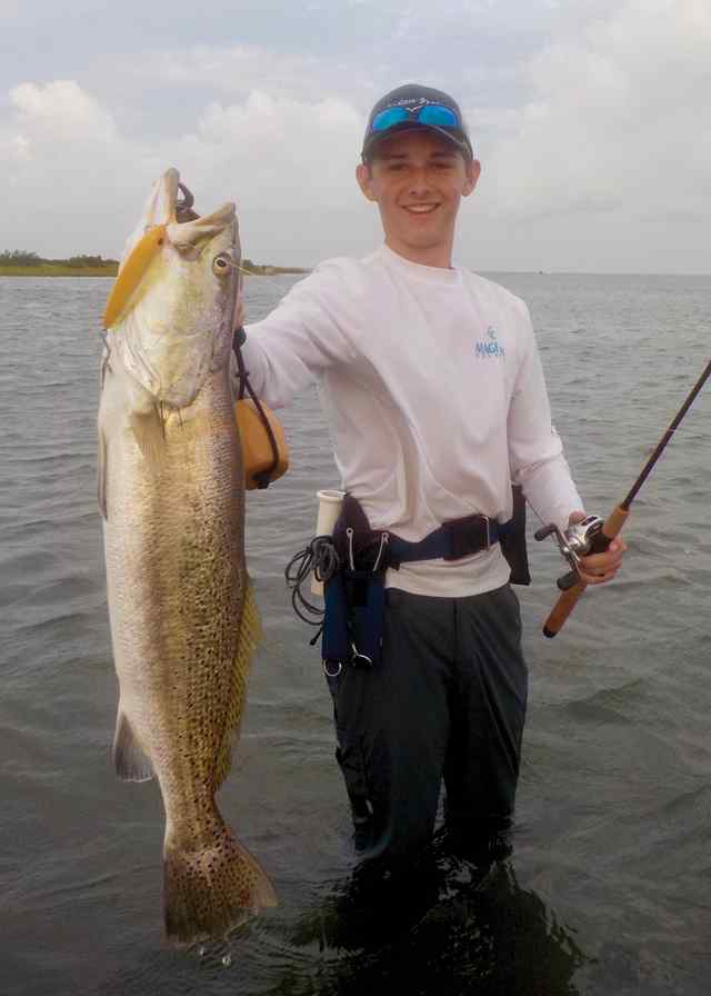 Carson Montgomery Port O'Connor - 27.5" 6.5 lb trout CPR, caught on a top water
