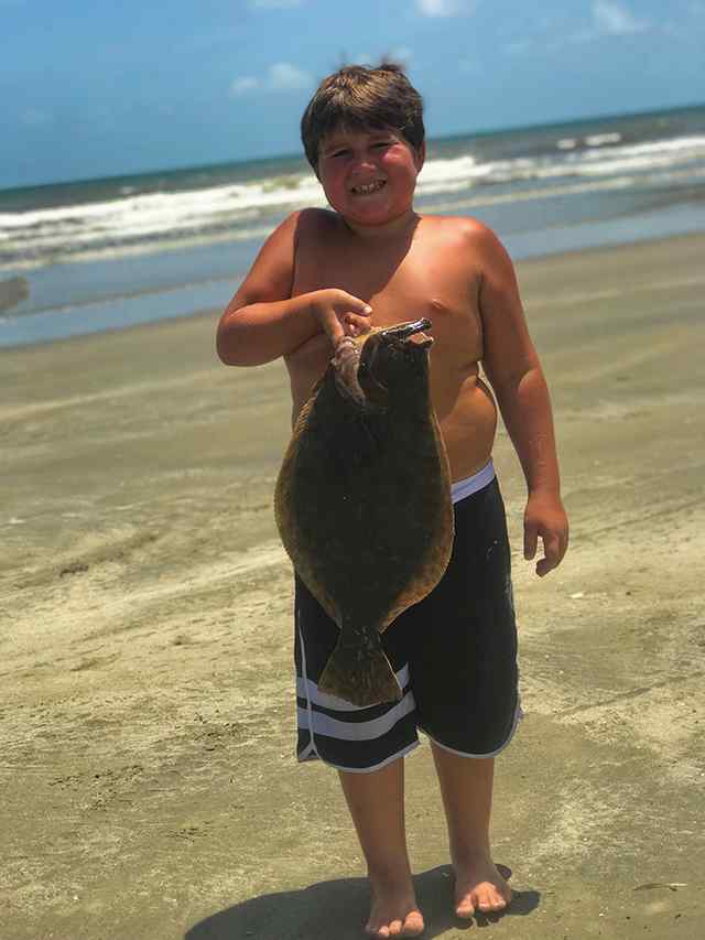 Keelyn Kilsby Galveston - 24" 5.5 lb first big flounder, caught waing in tidewaters on a jig head and tail