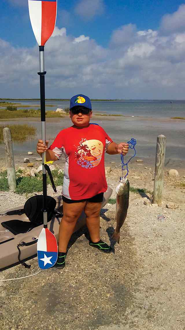 Cruz Narvaez IV Corpus Christi Bay - 23" first kayak redfish!