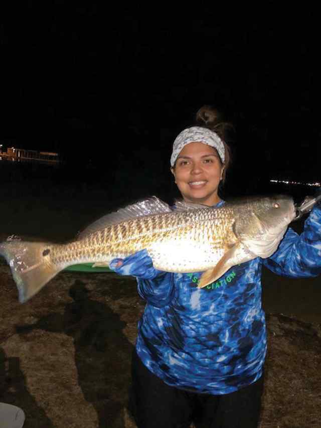 Ericka Ledesma 27" personal best redfish! Caught on artificial paddletail