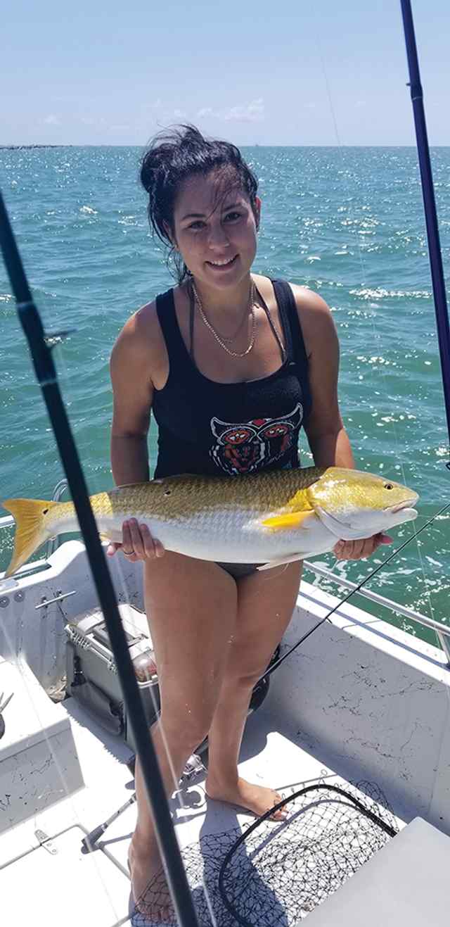 Hannah Sendejas Galveston North Jetty - 35" bull red, caught on light tackle