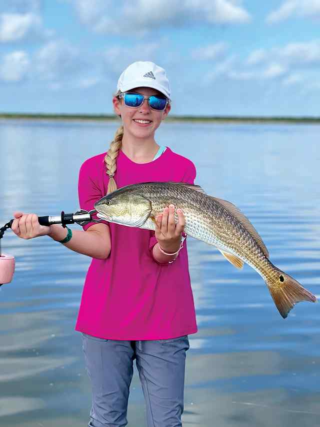 Kylie Trotti South Padre Island - 26" redfish, caught wade fishing with top water lure
