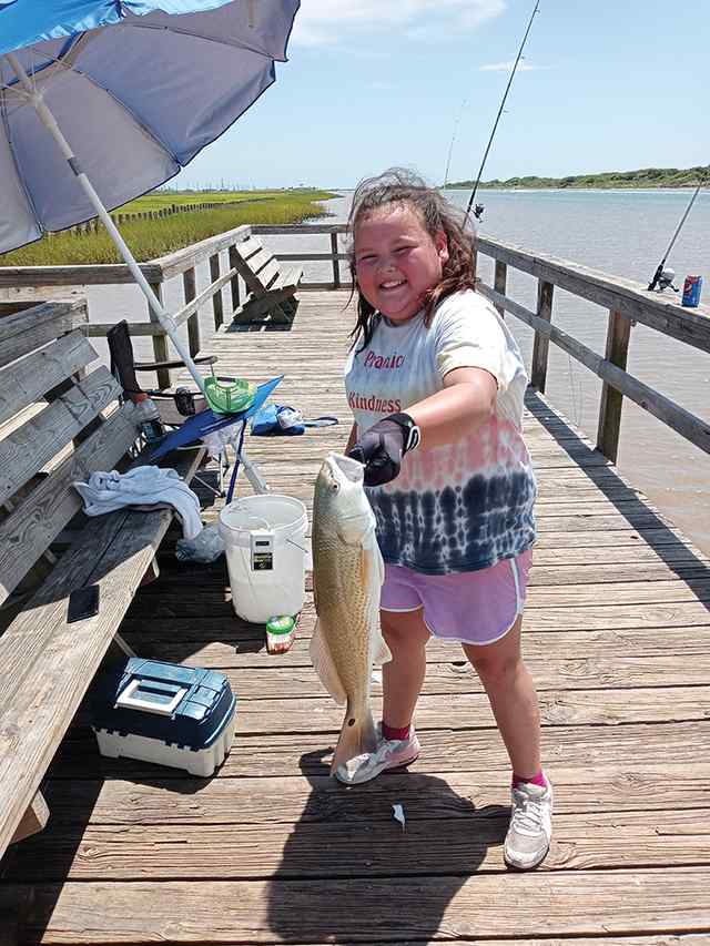 Ava Wukasch Matagorda Pier - 22" first keeper red! Caught on live shrimp